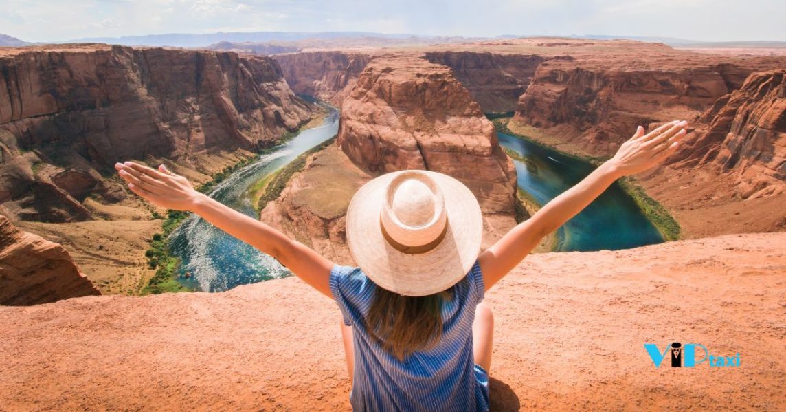 Woman sitting on overlooking mountain